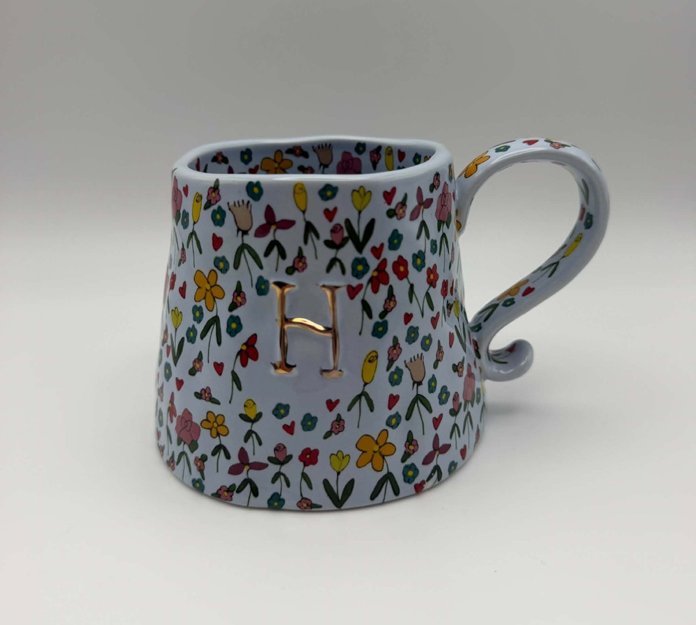 The Mud Fairy Gold Accent Monogram "H" Mug from Anthropologie Blue Whimsy Floral